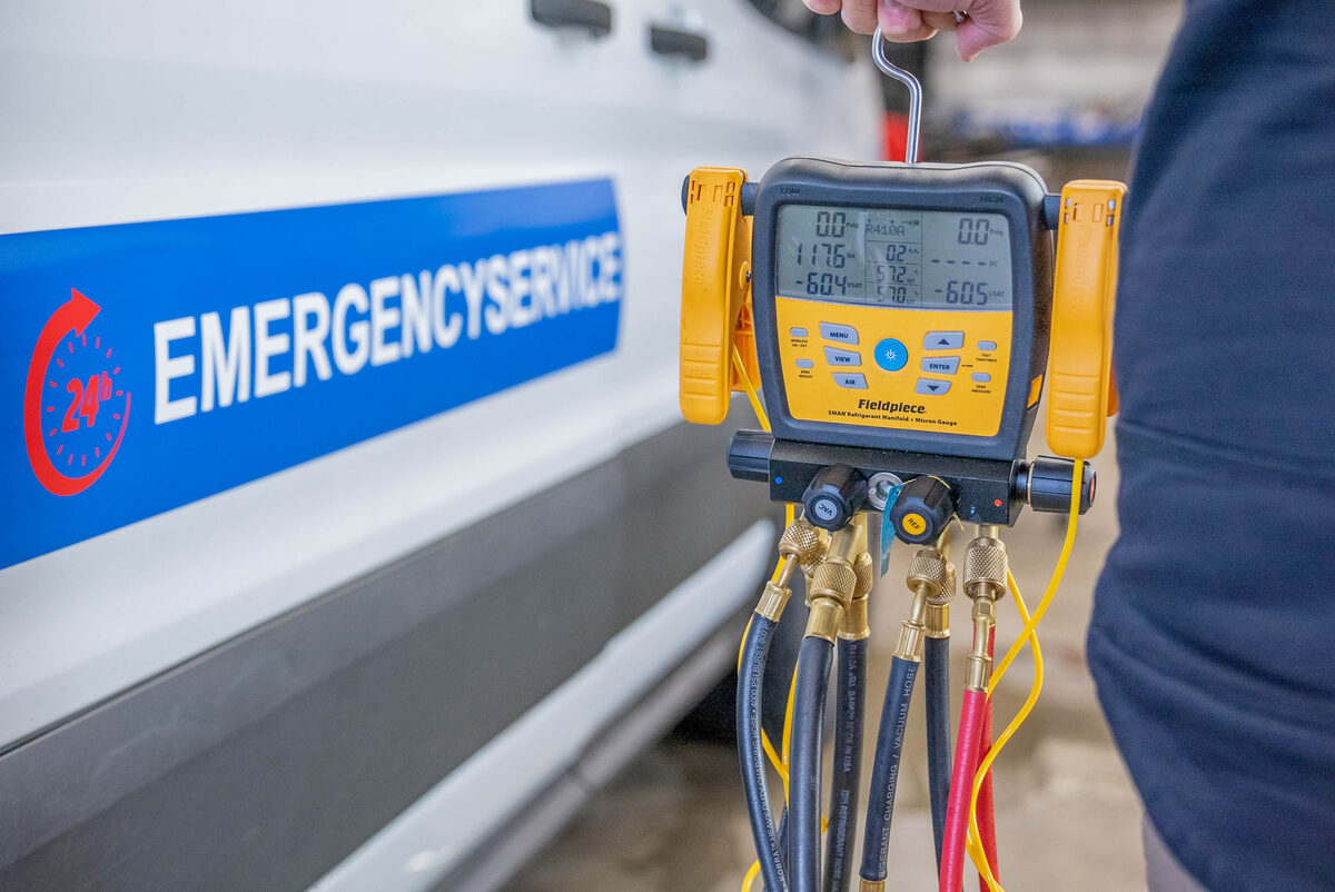 Fieldpiece refrigerant manifold gauges on a 24/7 emergency call