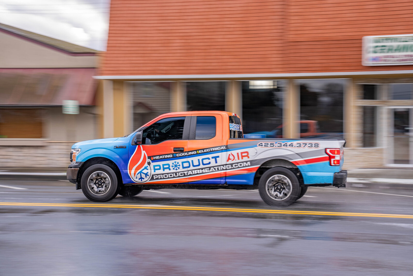 Branded Product Air F-150 service truck on the road